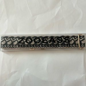 Black and tan wide shoulder purse strap